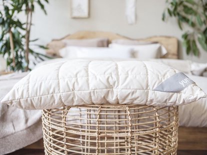 Yumeko Kussen wol deluxe 60x70 stevig 
Vulling: 100% biologische wolbolletjes
Tijk: 100% biologisch katoen met padding gemaakt van 100% biologisch katoen