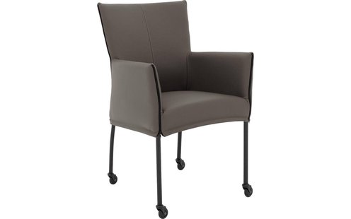 Goossens Eetkamerstoel Funk Zwarte Poten grijs leer met armleuning en met wielenZwart skater wiel met zwarte kap, modern design