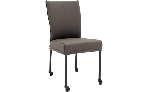 Goossens Eetkamerstoel Funk Zwarte Poten grijs leer leuning en Zwart skater wiel met zwarte kapmet wielen, modern design