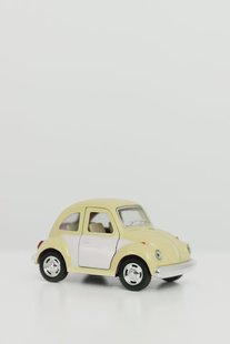 Metalen volkswagen beetle pastel lichtgeel