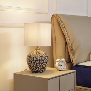 Lindby tafellamp Thalassia, zwart/wit, Ø 26cm, keramiek