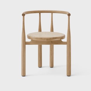 New Works Bukowski stoel met armleuningen Geoliede eikenhouten rotan