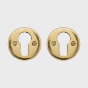 De Oude Deurklink Cilinder rozet rond messing gelakt