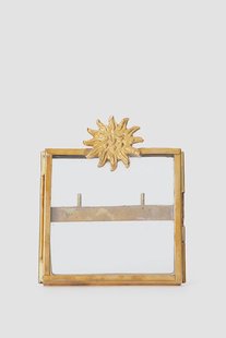 Goudkleurig fotolijstje met zon