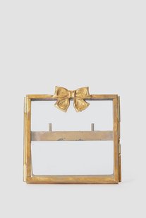 Goudkleurig fotolijstje met strik