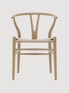 Houten stoel CH24 Wishbone Chair met handgevlochten zitvlak