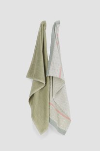 Groene handdoek en theedoek