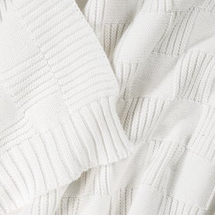 Plaid in tricot, Caneli