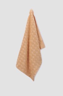 Lichtoranje handdoek met hartjes print