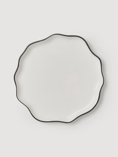 Geribbeld porseleinen onderbord Bia