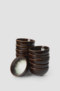 Donkerbruine house of treasures kom klein