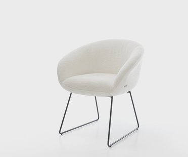 DELIFE Eetkamerstoel Vinka-Flex met armleuning bouclé zacht beige slipframe zwart pocketveer kern