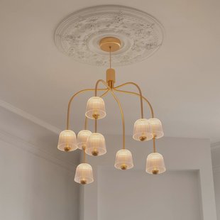 Nuura Aps Nuura LED kroonluchter Asteea 9, Ø 66 cm, messingkleurig/helder