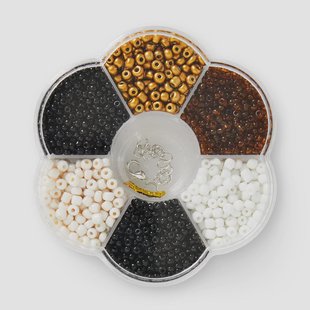 Set bruine, gouden en witte glazen kralen