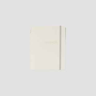 Beige notitieboekje met balpen