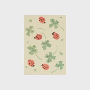 Kaart, lieveheersbeestjes en klavertjes