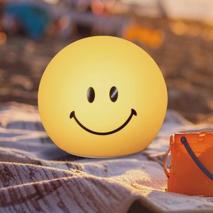 FH Lighting LED-batterijlamp Smiley, geel, Ø 13 cm, siliconen