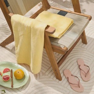 BEACHWAVE strandlaken Shell - geel (velours) (180x100 cm)