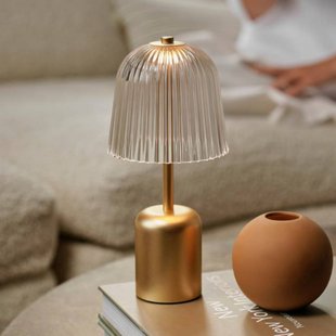 Nuura Aps Nuura LED tafellamp Asteea, messingkleurig, hoogte 27 cm