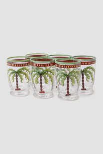 Groene waterglazen met palmboom