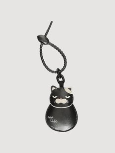 Handgemaakte tas charm Moody Cat van vegan leer