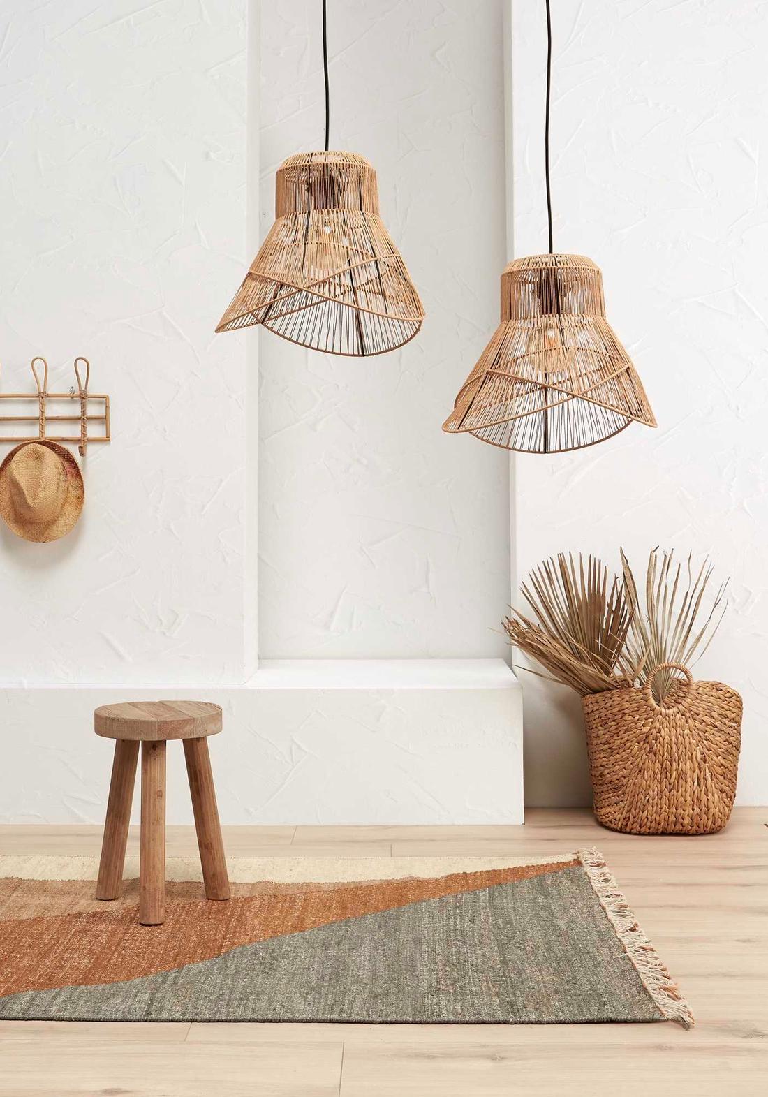 Berg je spullen op in een trendy woonitem, zoals in gevlochten rieten manden.