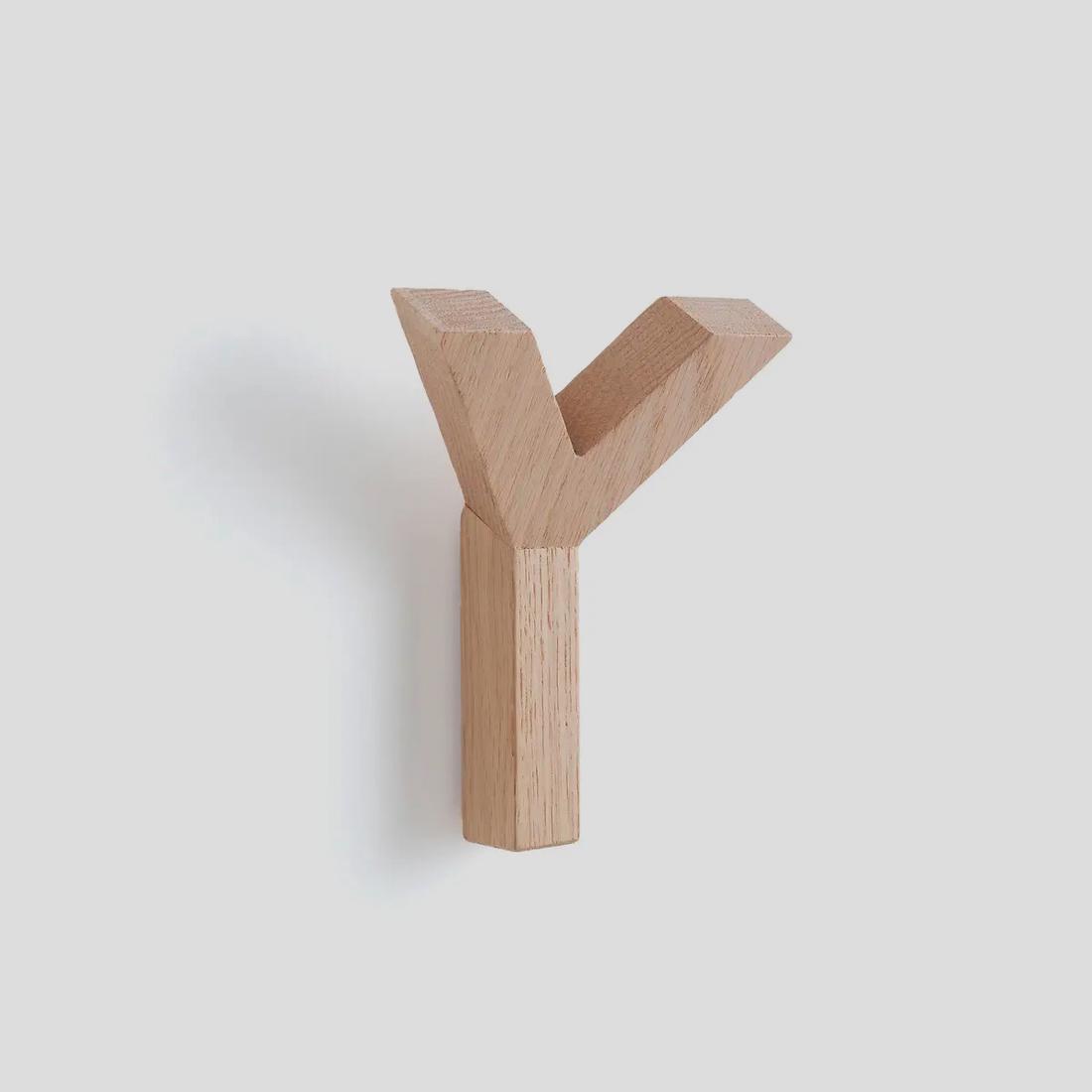 Bekijk kapstok Minimalisme op z’n best. Deze kapstok is ideaal voor kleine ruimtes, of wanneer je van een simplistische look houdt.