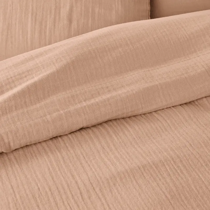 Pluspunt: dit katoenen dekbedovertrek hoef je niet te strijken. Hierdoor blijven de wafels juist intact. 