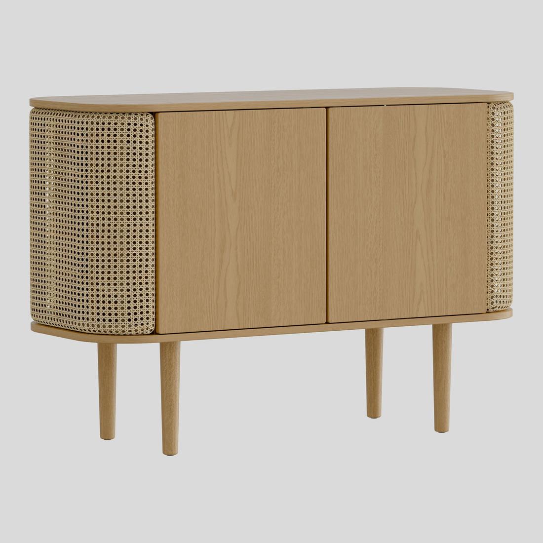 Bekijk de kast Licht eikenhout vormt een mooie combinatie met rotan webbing.