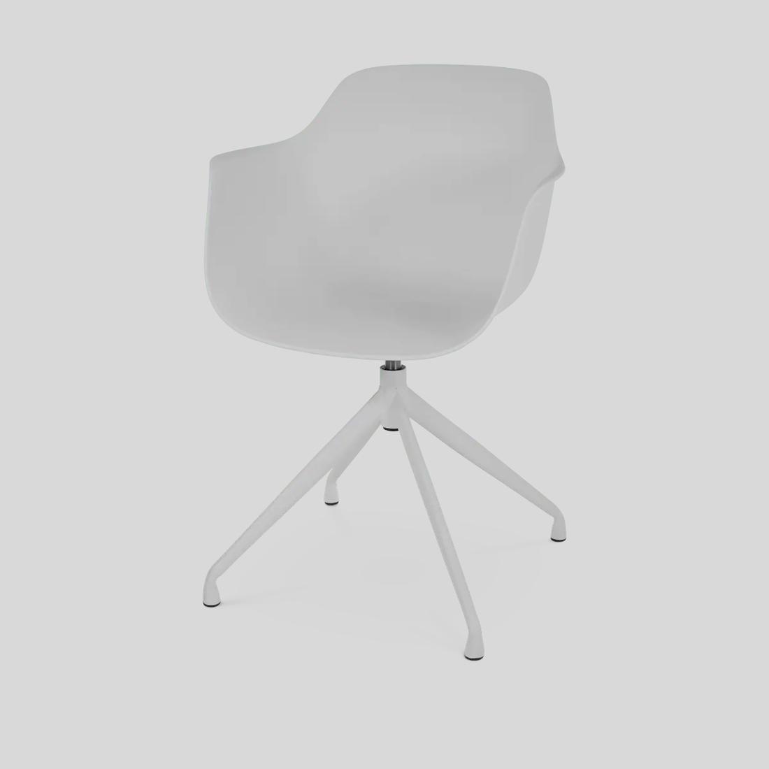 Bekijk deze stoel Een witte eetkamer met armleuningen en draaibaar wit onderstel: dat is dubbel handig.