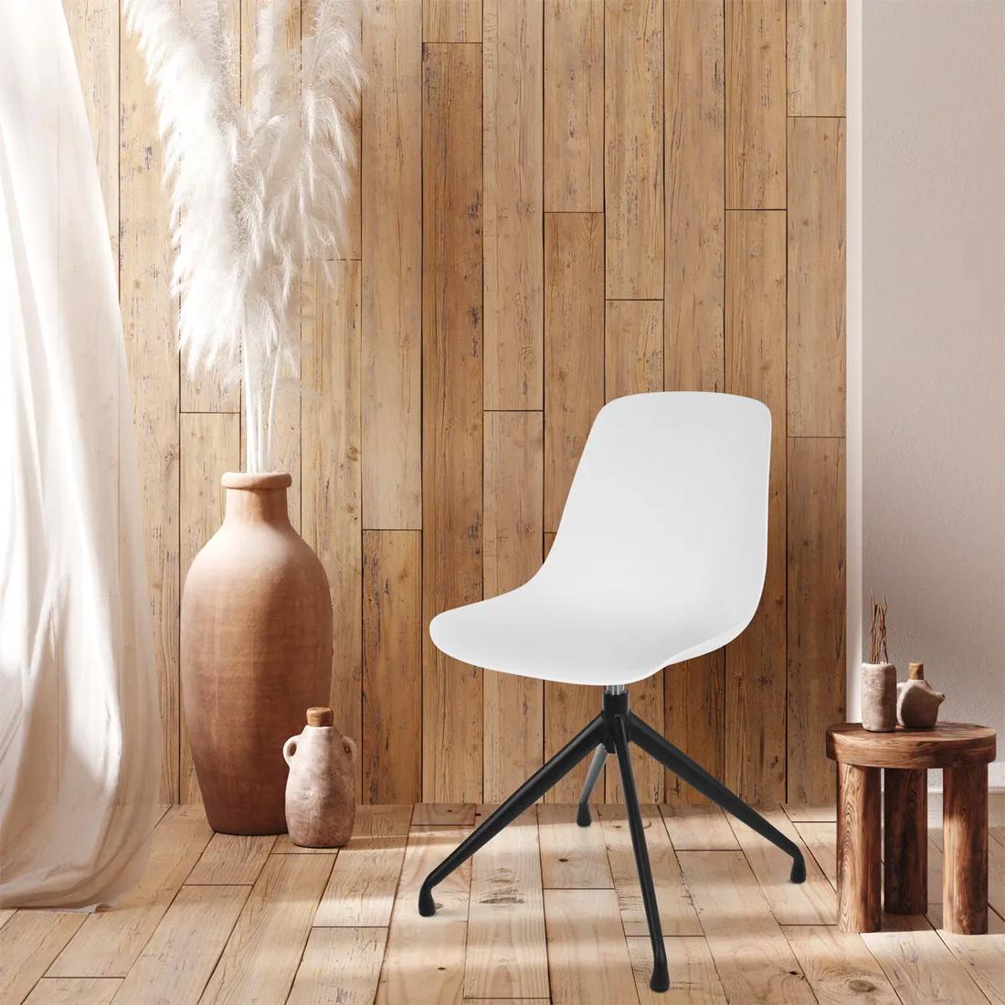 Bekijk deze stoel Tip: combineer deze witte stoel met een zwart onderstel voor wat afwisseling aan de eettafel.