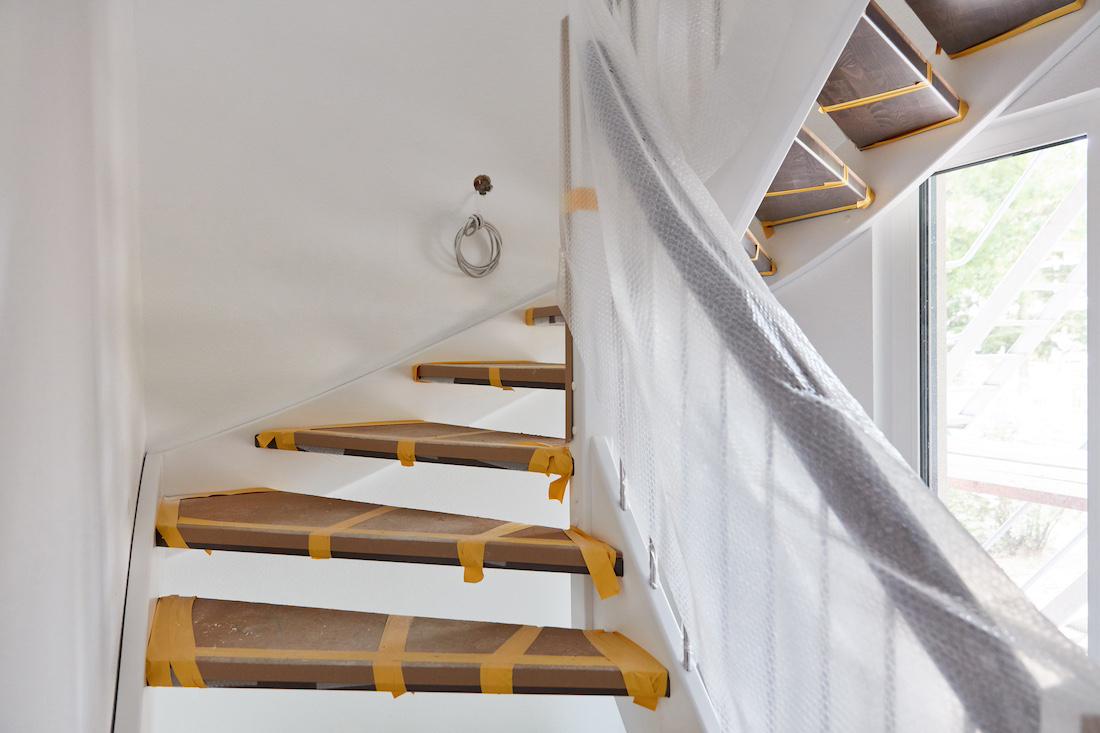 Traprenovatie in nieuwbouwwoningen: Hoe je de perfecte trap creëert